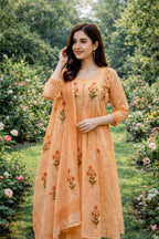 Pastel Peach colour Handblock elephant printed Straight 3 pcs Kurta set for women with Sequin handwork detailing on neckline with Tassels